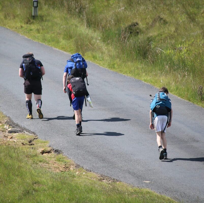 team-climbing-hill_orig